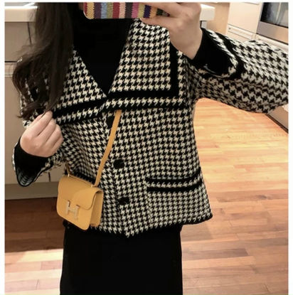 Ảnh của Aó khoác dạ phối viền hot trend năm nay
